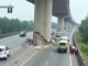 The bridge’s support collapsed after the earthquake, but it was only the outer concrete that hit the car.